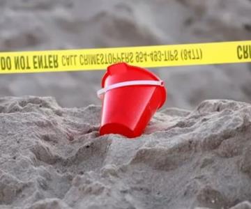 Muere niña enterrada en un hoyo que cavó en playa de Miami