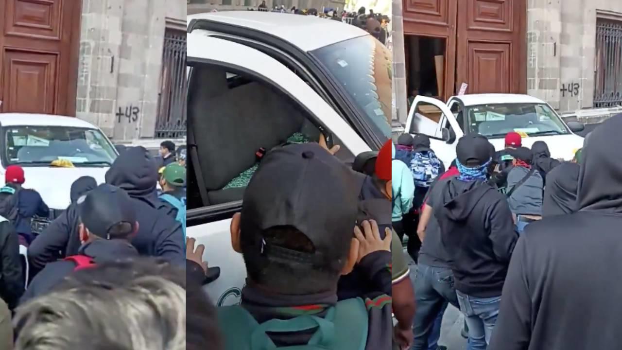 Normalistas de Ayotzinapa derriban puerta de Palacio Nacional