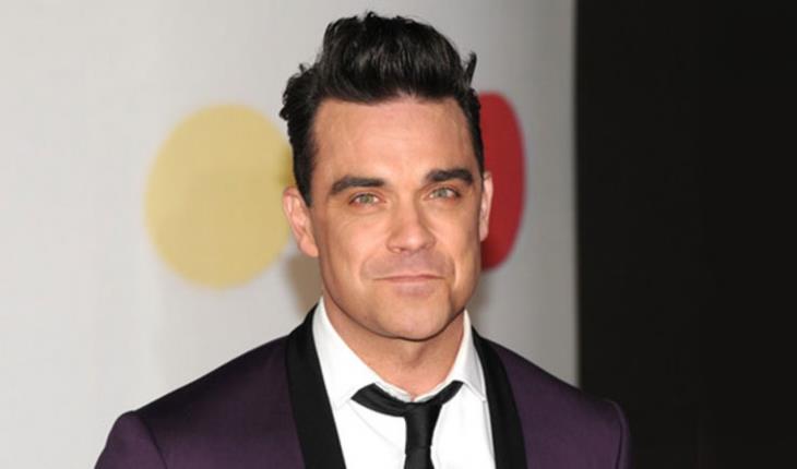 Robbie Williams lanzará álbum  por sus 25 años de carrera
